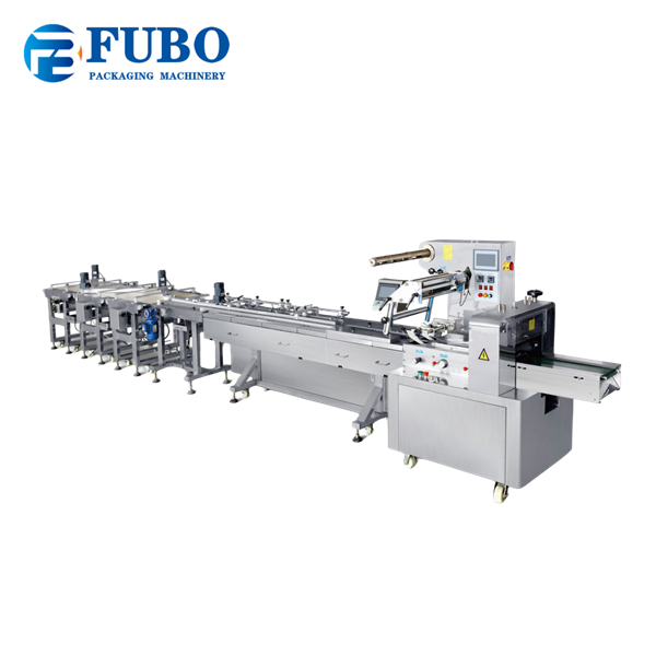 Automatic horizontal flow wrapping machine